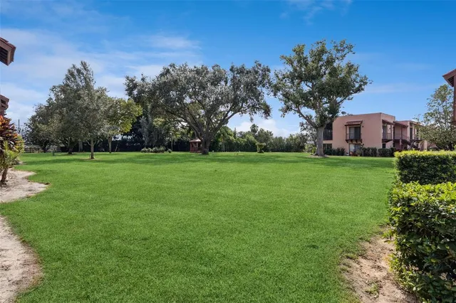 a view of a house with a big yard