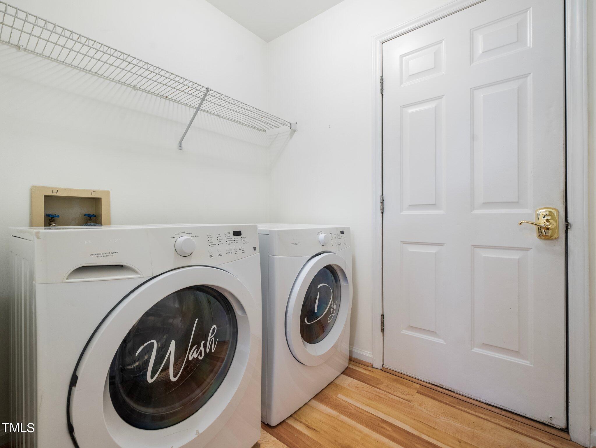 112 Riva Trace Drive Cary, NC 27513 - Photo 11 of 29 a utility room with dryer and washer