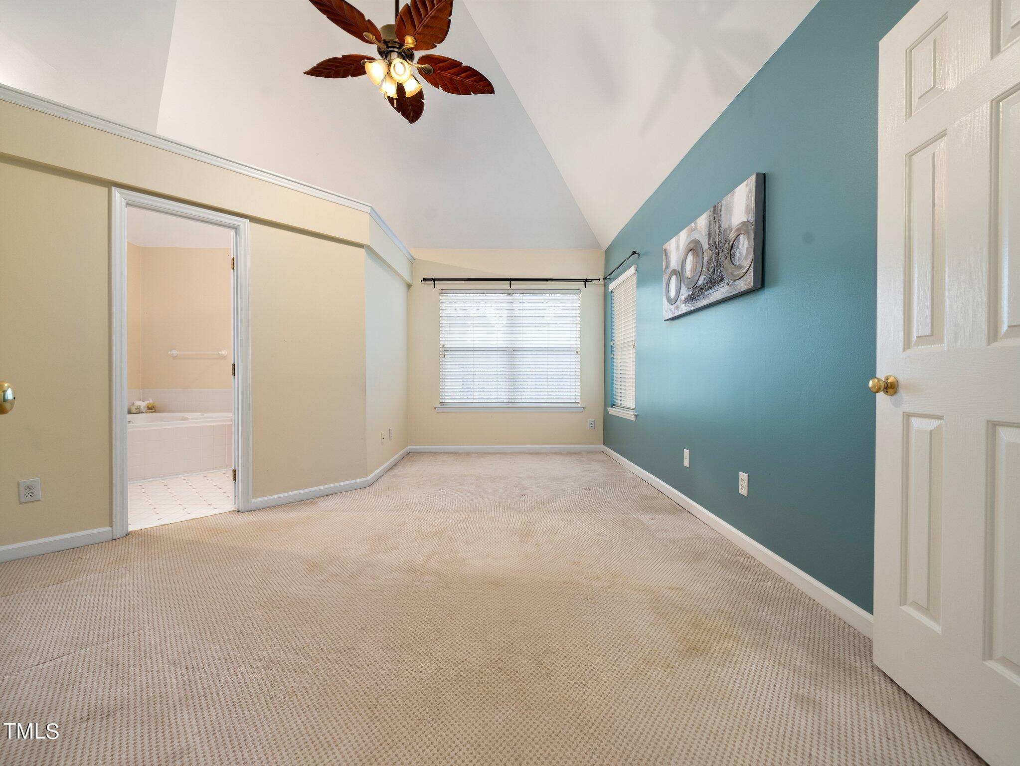 112 Riva Trace Drive Cary, NC 27513 - Photo 14 of 29 an empty room with windows and fan