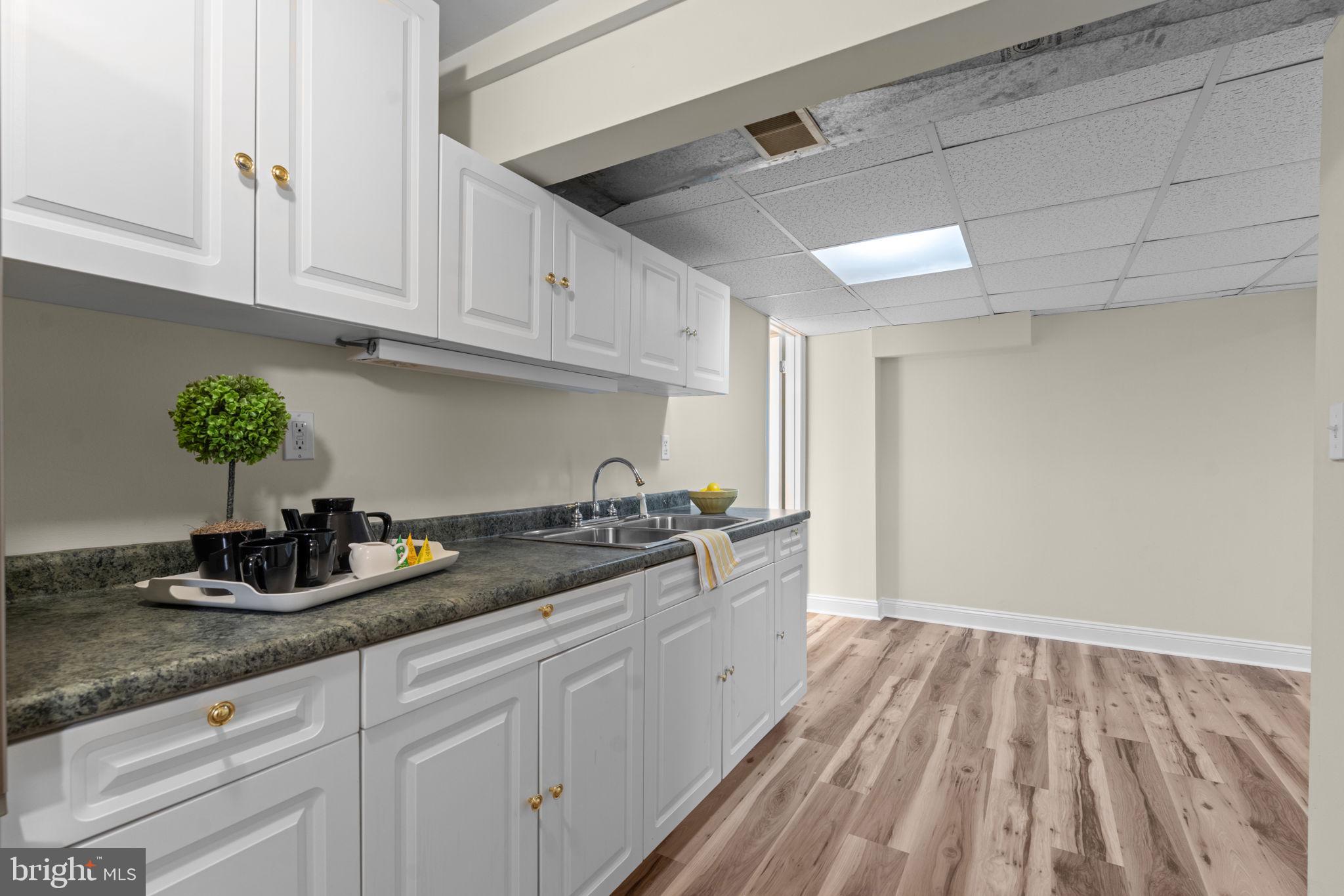 11492 Rawhide Road Lusby, MD 20657 - Photo 42 of 96 Lower Level Wet Bar