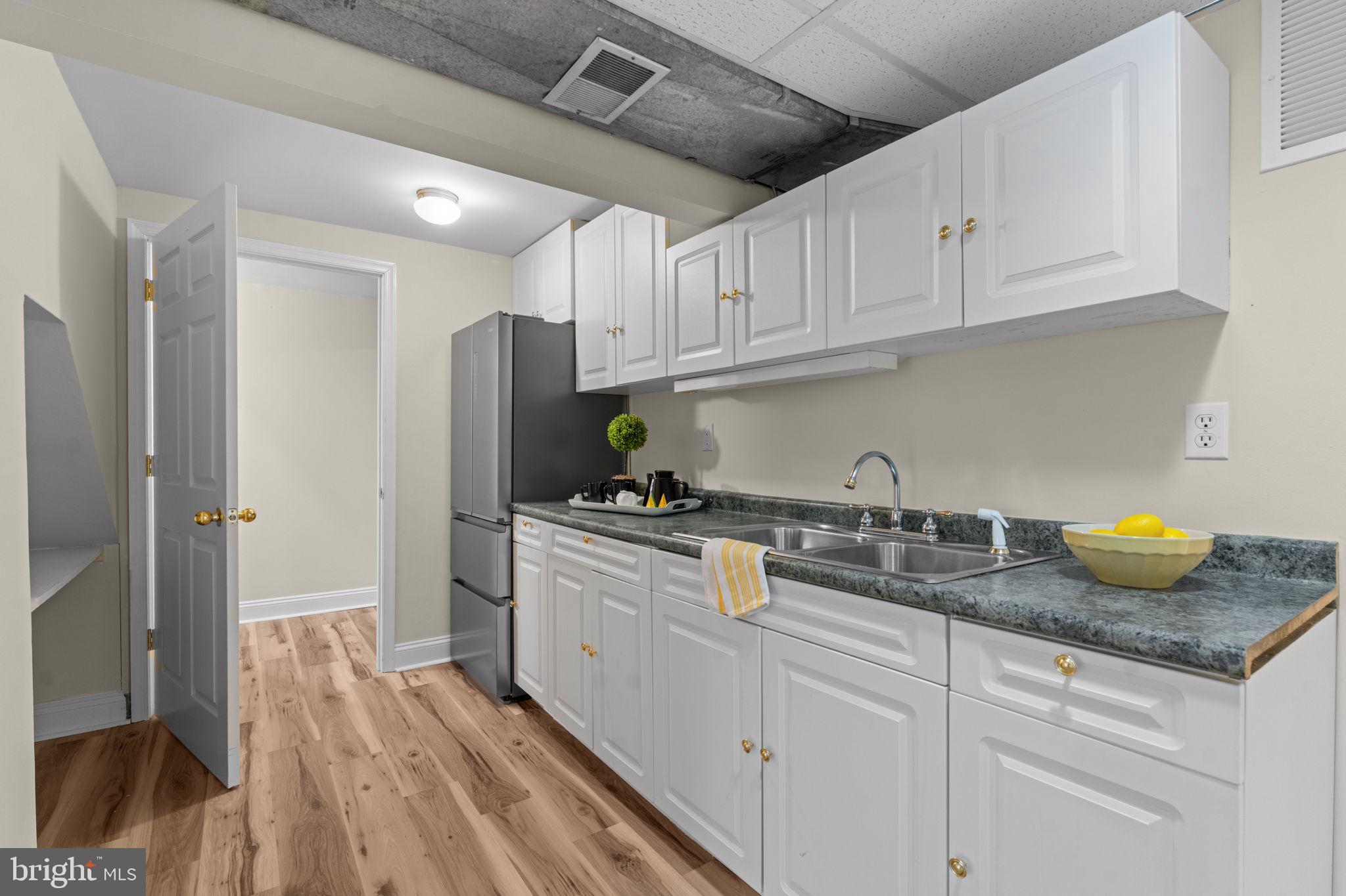 11492 Rawhide Road Lusby, MD 20657 - Photo 43 of 96 Lower Level Wet Bar