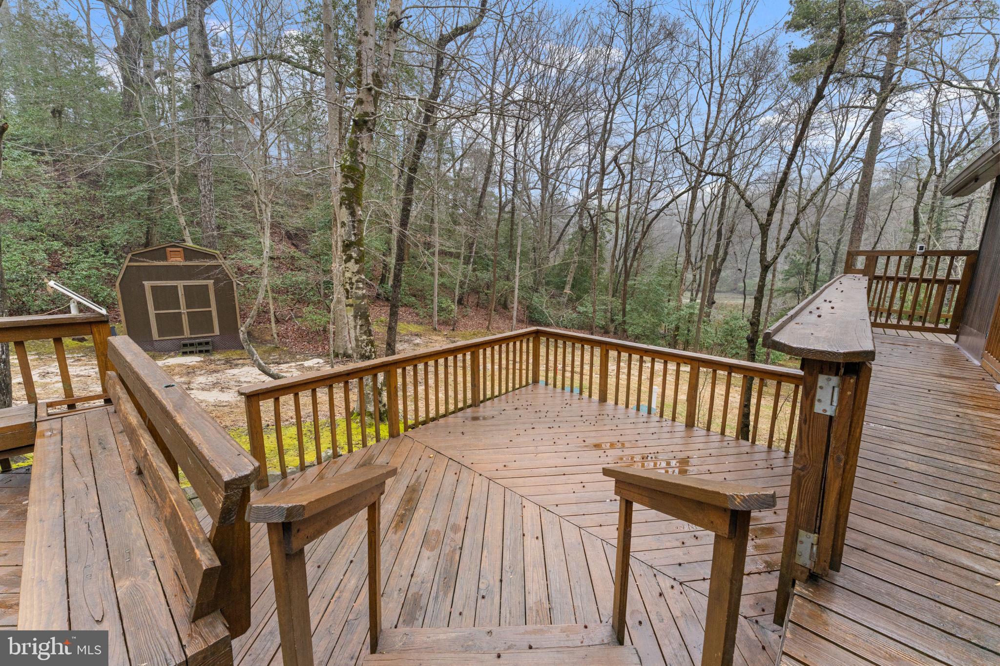 11492 Rawhide Road Lusby, MD 20657 - Photo 64 of 96 a view of balcony with wooden floor and fence