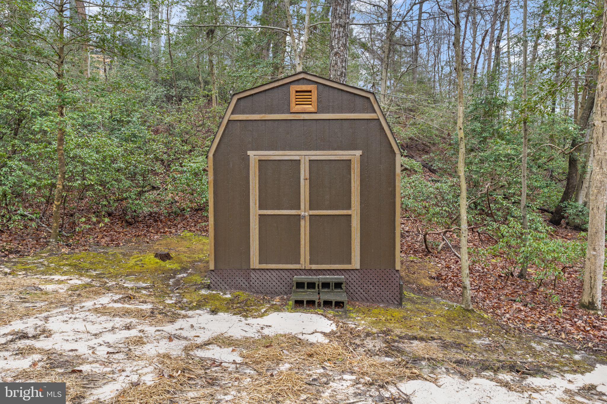 11492 Rawhide Road Lusby, MD 20657 - Photo 78 of 96 a front view of a house with a yard