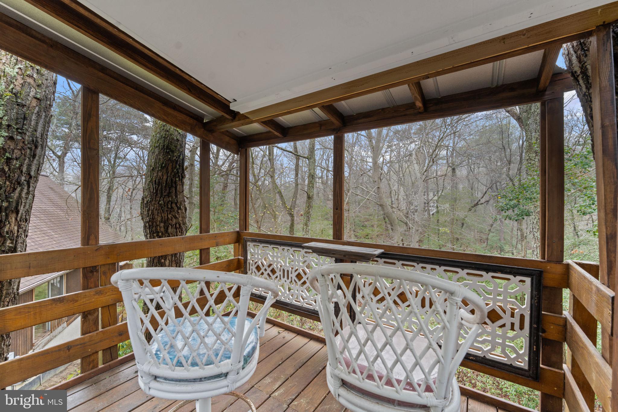 11492 Rawhide Road Lusby, MD 20657 - Photo 81 of 96 a front view of a house with wooden floor