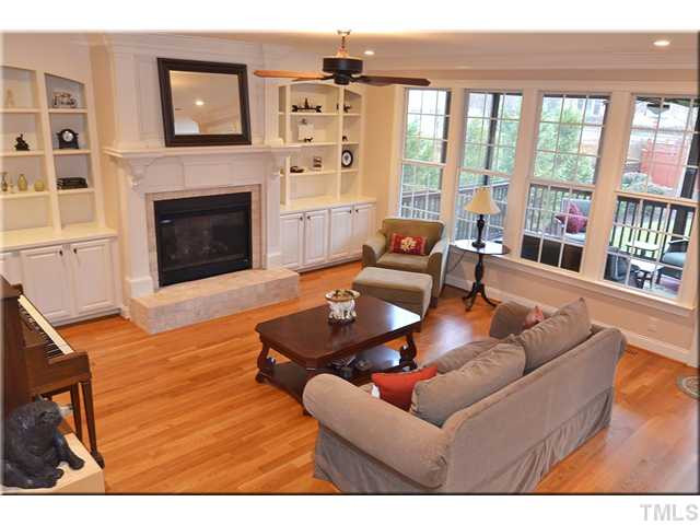 3611 Forward Way Raleigh, NC 27614 - Photo 4 of 25 Large family room with lots of natural light. The gas fireplace has unique pedestal accents and a lovely stone hearth Den/Family/Great Room