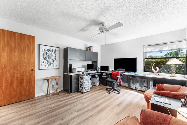 a bathroom with a double vanity sink toilet and shower