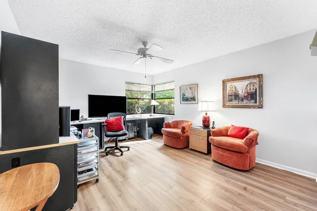 a kitchen with a sink cabinets and window