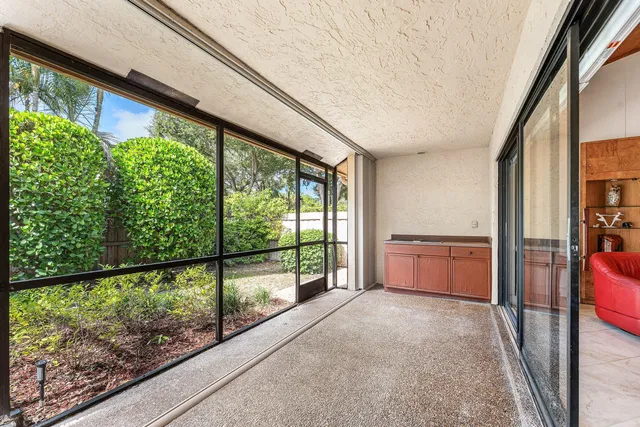 a view of a garden with a fountain