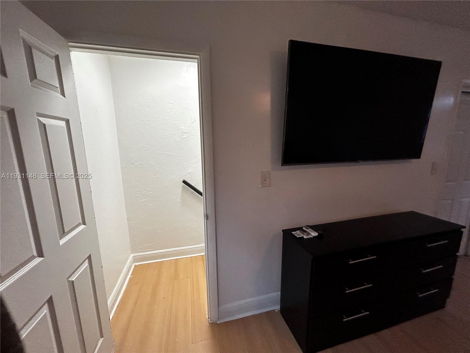 2809 Southwest 8th Street, Unit B Fort Lauderdale, FL 33312 - Photo 21 of 24 a bathroom with a sink and a mirror