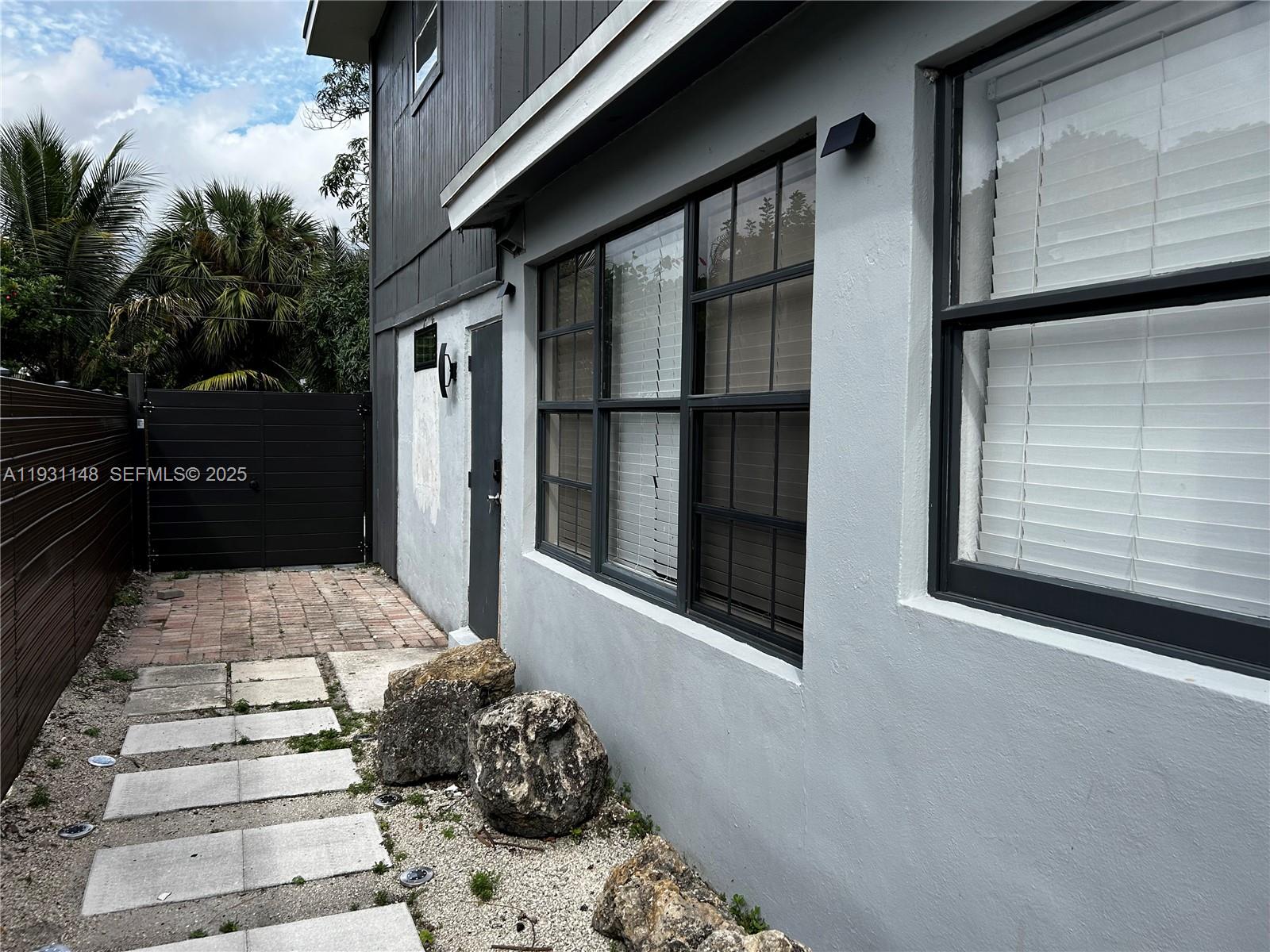 2809 Southwest 8th Street, Unit B Fort Lauderdale, FL 33312 - Photo 6 of 24 a view of a entryway door front of house