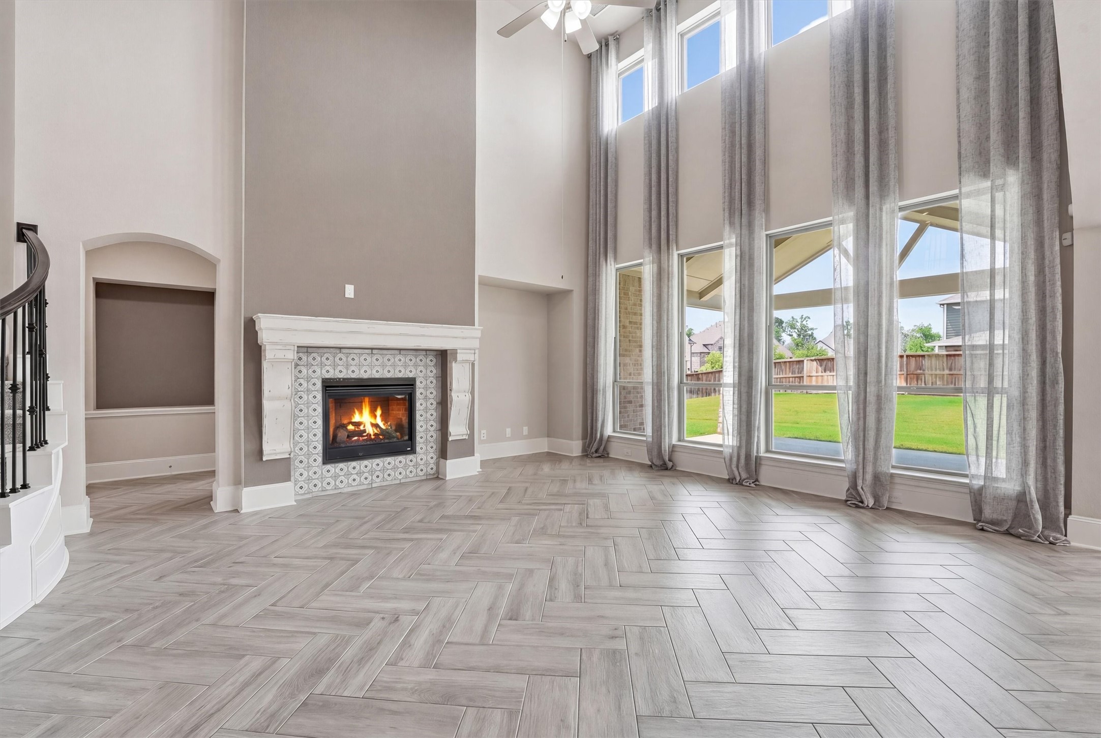 8673 Burdekin Road Magnolia, TX 77354 - Photo 23 of 50 Notice all of the natural lighting and beautiful fireplace mantle.