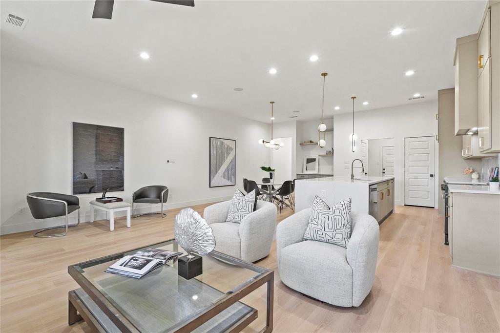 2404 52nd Street Dallas, TX 75216 - Photo 7 of 21 a living room with furniture and a table