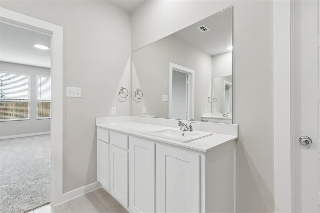 2303 Wind River Road Princeton, TX 75407 - Photo 16 of 32 Primary Bathroom in the Winters home plan by Trophy Signature Homes – REPRESENTATIVE PHOTO