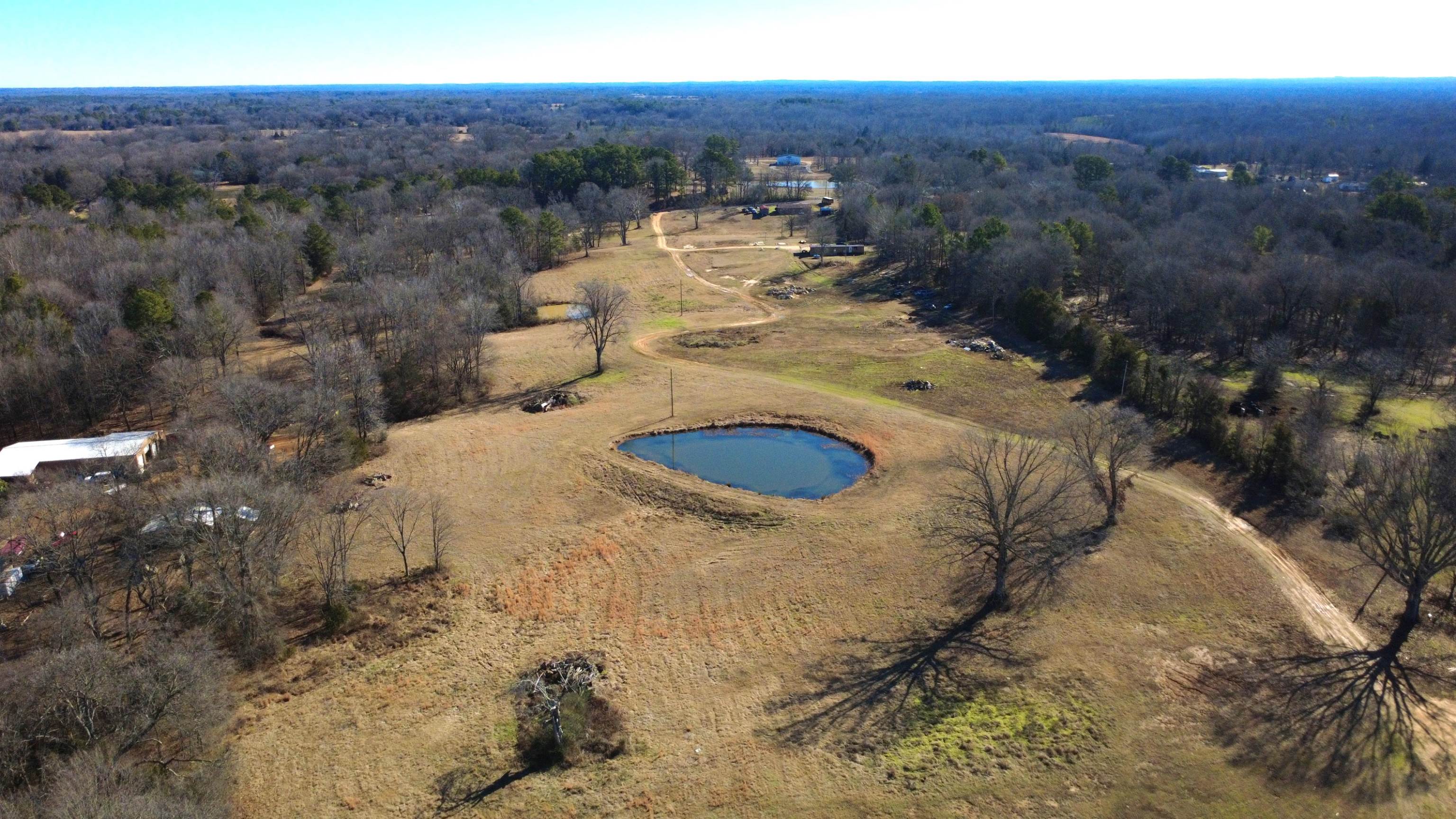 2023 Gravel Springs Road Senatobia, MS 38668 - Photo 8 of 9 a view of a backyard of a house