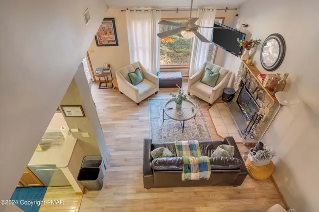 a view of living room with furniture and a window