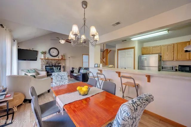 a view of a dining room with furniture