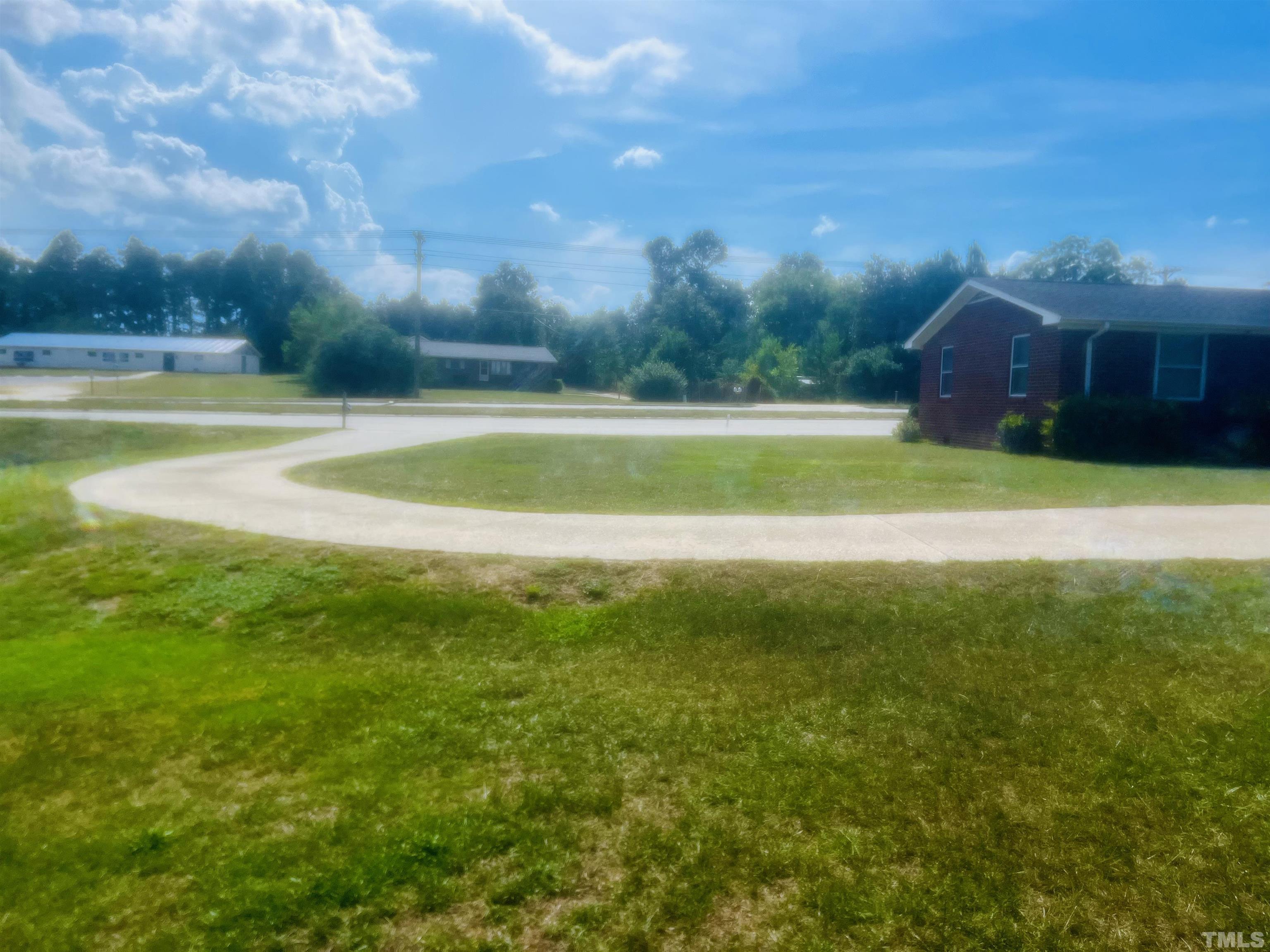 2164 Ray Road Spring Lake, NC 28390 - Photo 2 of 17 a view of a house with a yard