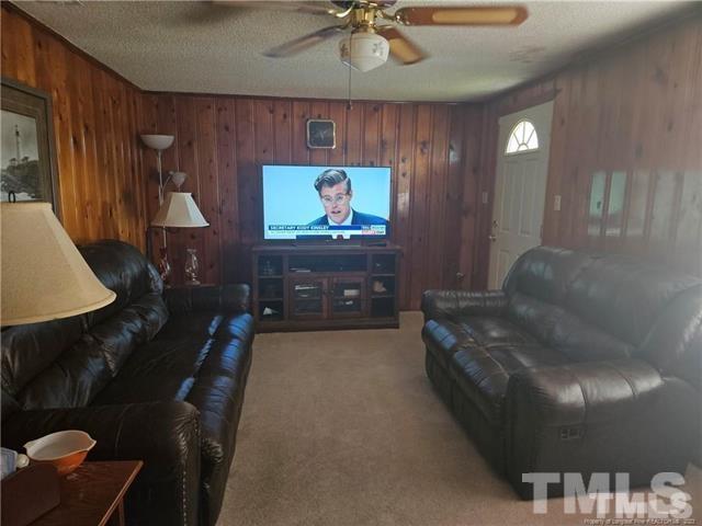 2164 Ray Road Spring Lake, NC 28390 - Photo 7 of 17 a living room with furniture and a fireplace
