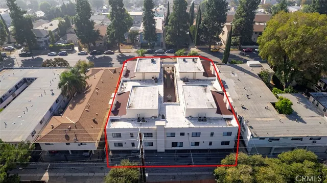 an aerial view of a city with lots of residential buildings