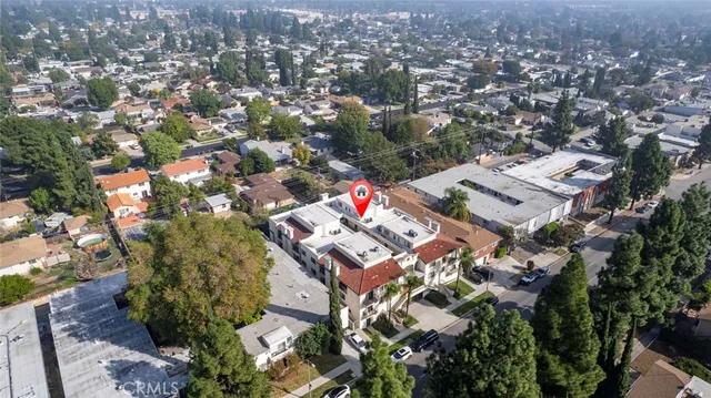 an aerial view of residential building with parking space