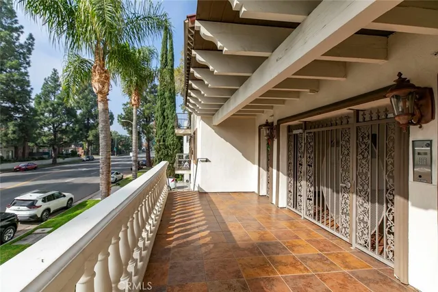 an aerial view of multiple houses with yard