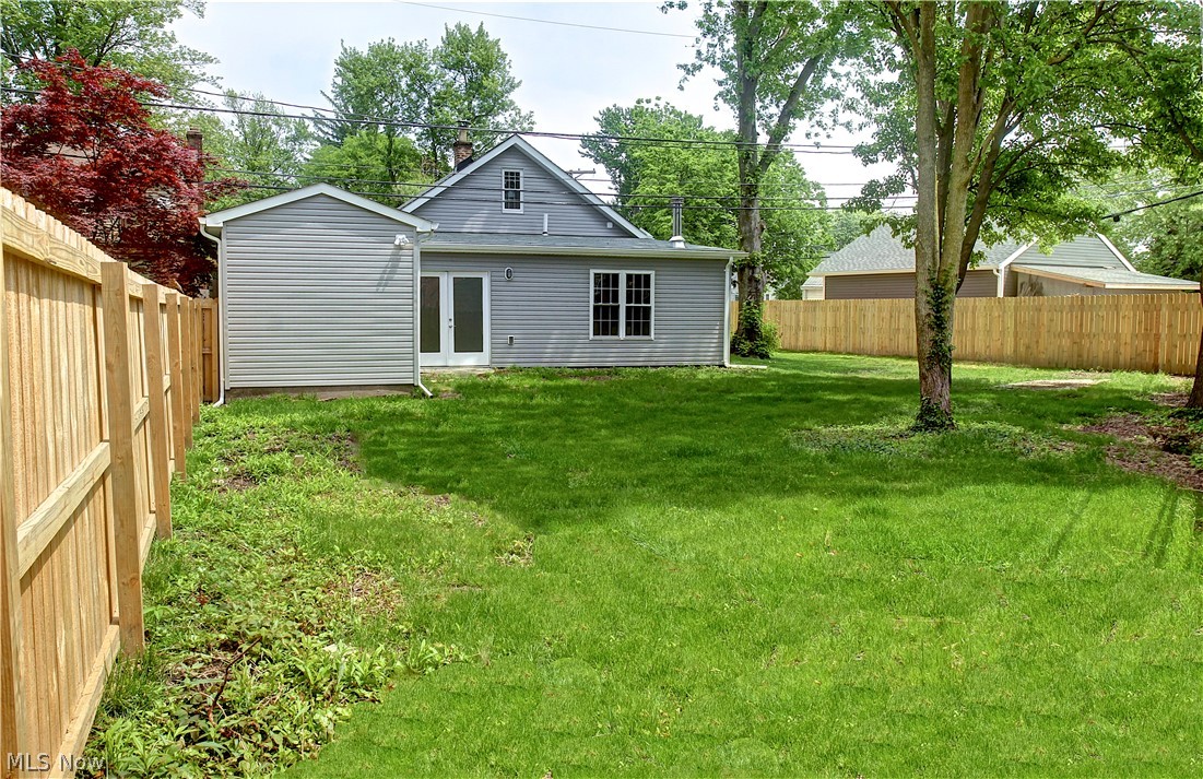 14507 Glencliffe Road Cleveland, OH 44111 - Photo 29 of 31 Back of house with a yard