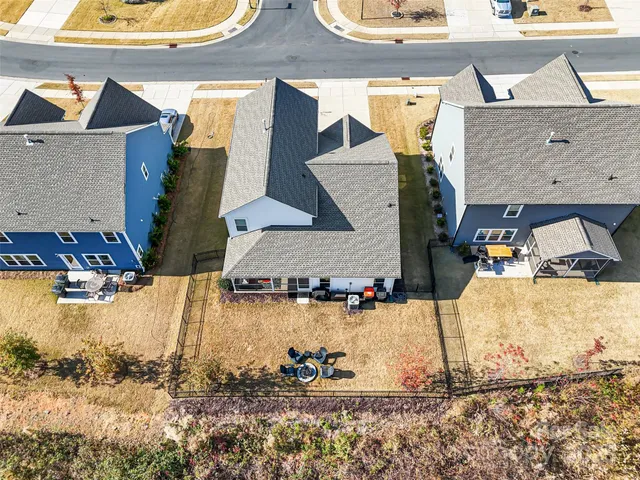 a view of swimming pool with outdoor seating