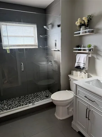 a view of a livingroom with a staircase