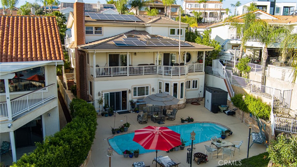 Back of home, Pool, some of the 40 owned Solar Panels