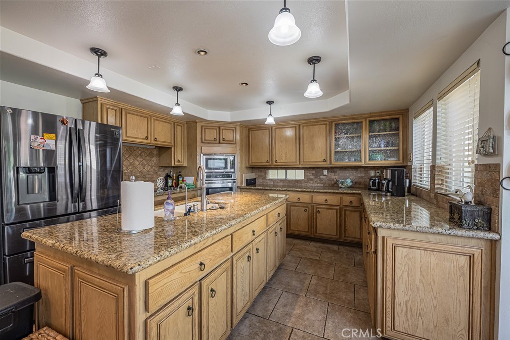 30010 Big Range Road Canyon Lake, CA 92587 - Photo 31 of 55 Kitchen w/ Island & Granite Counter tops