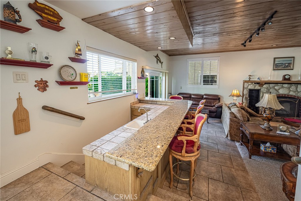 30010 Big Range Road Canyon Lake, CA 92587 - Photo 38 of 55 Granite Counter Bar off Living Room- convenient for entertaining