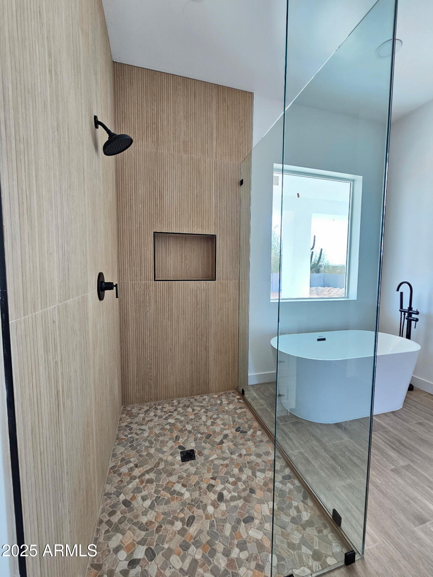 947 North Warner Drive Apache Junction, AZ 85120 - Photo 15 of 26 a bathroom with a sink a mirror and shower
