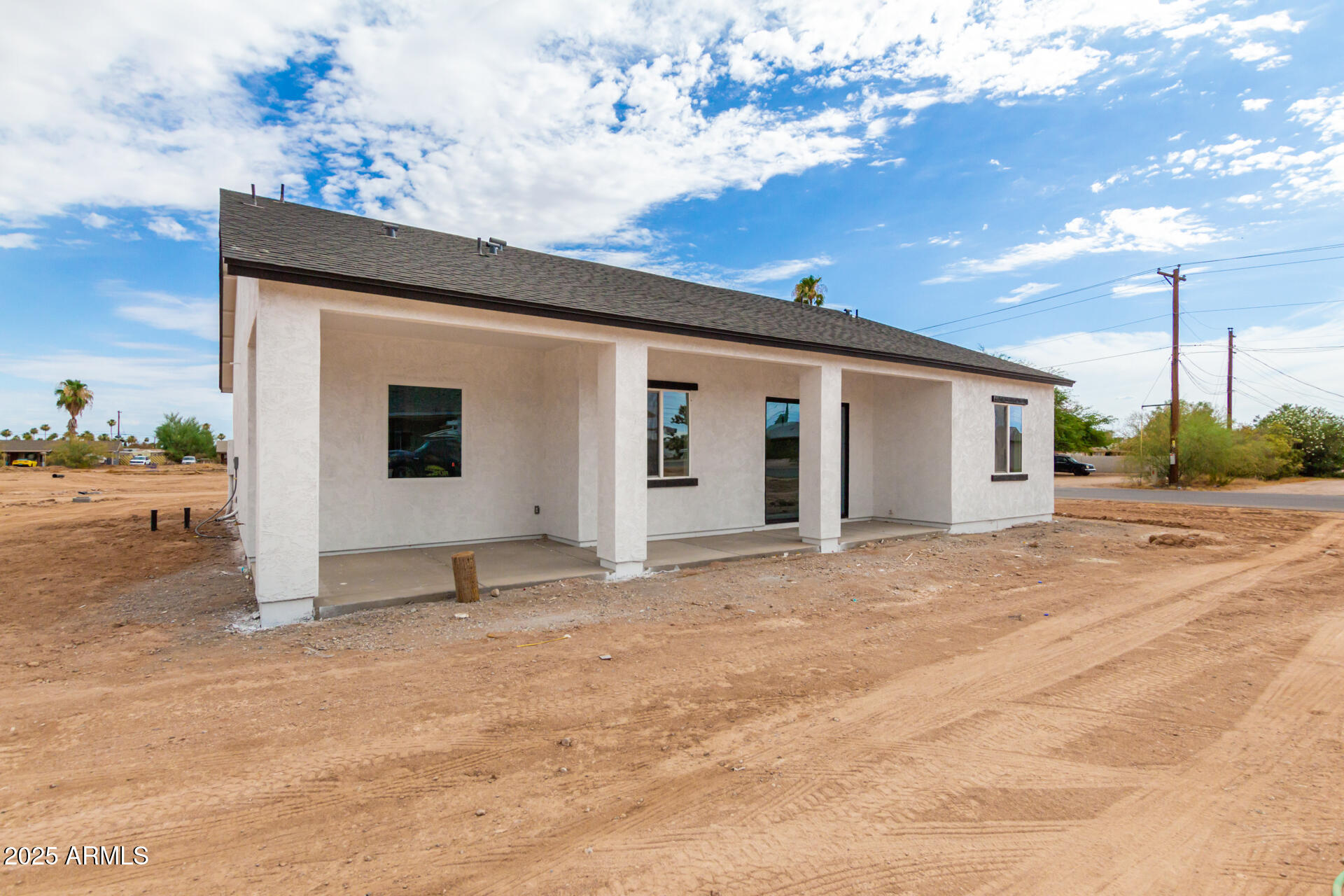 947 North Warner Drive Apache Junction, AZ 85120 - Photo 23 of 26 a view of a house with a patio