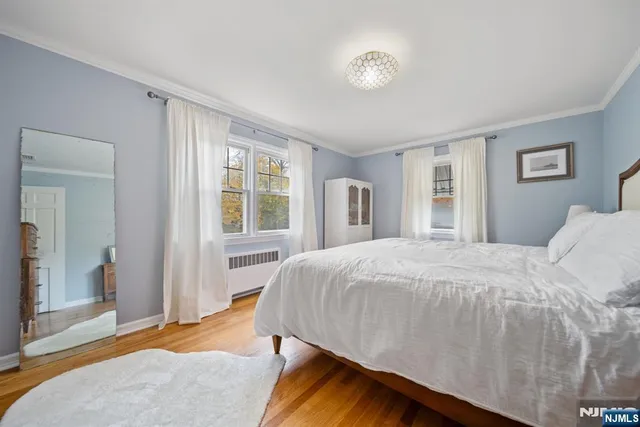 a bathroom with a sink a double vanity and a mirror