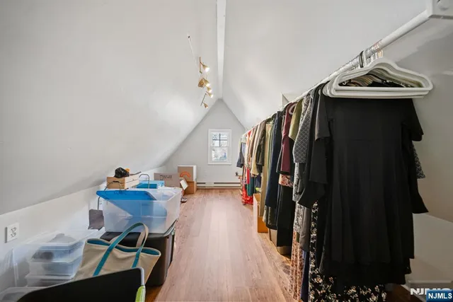 a view of an empty room with stairs