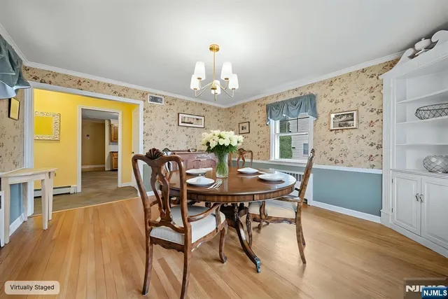 a kitchen with a refrigerator sink and cabinets