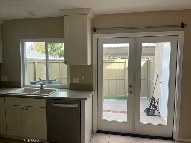 a view of a balcony with an outdoor seating