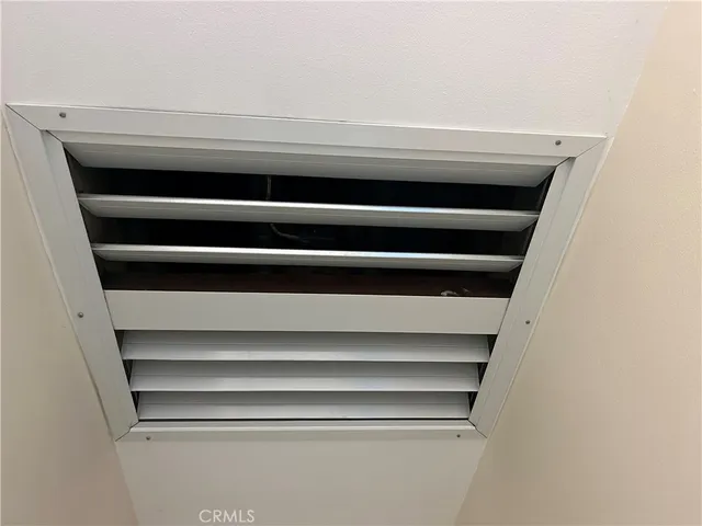 a view of a room that has a window