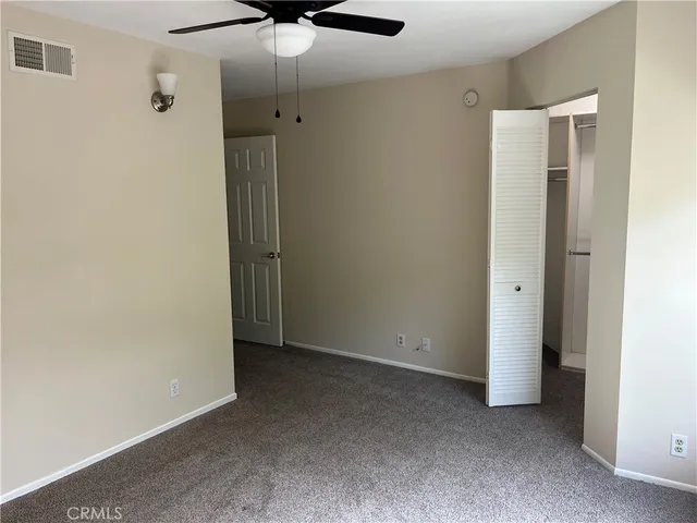 a bathroom with a toilet a sink and shower