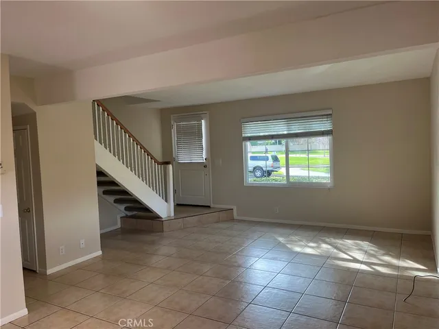 a white toilet sitting next to a shower