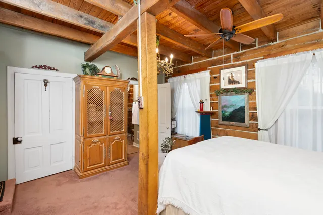 a bathroom with a double vanity sink mirror and shower