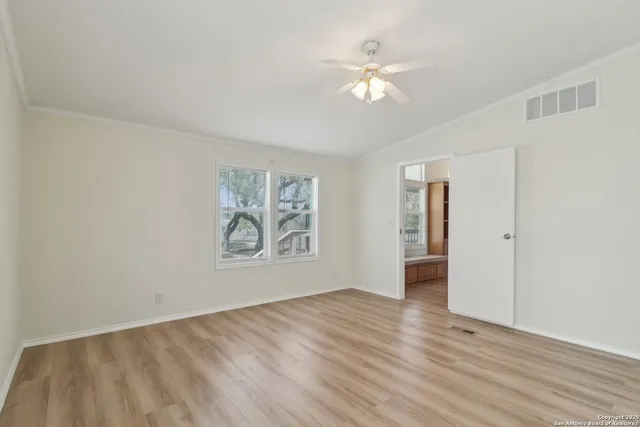 a bathroom with a granite countertop sink