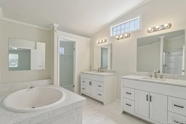 a view of room with window and ceiling fan