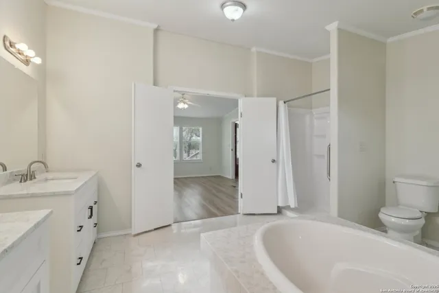 a view of balcony with wooden floor and fence