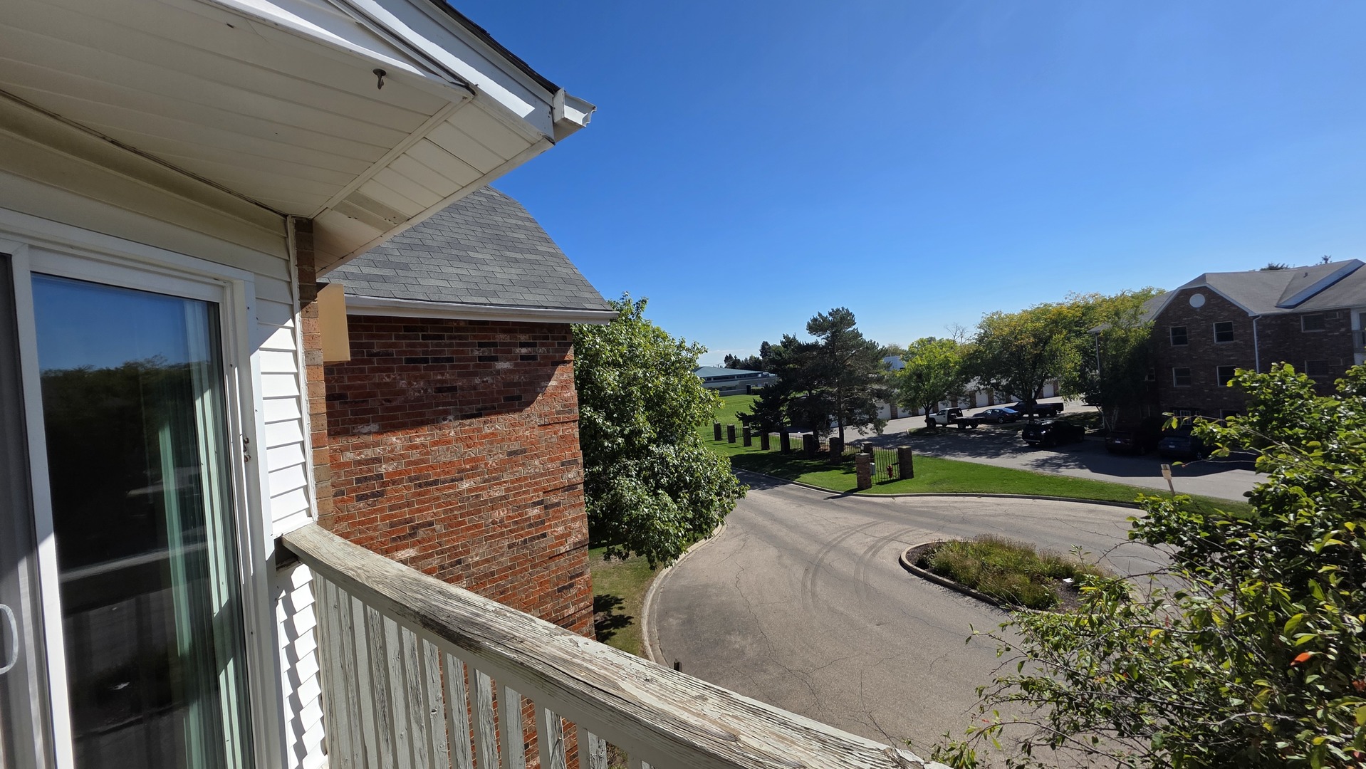 4302 West Shamrock Lane, Unit 3C McHenry, IL 60050 - Photo 16 of 20 a view of a backyard with sitting area