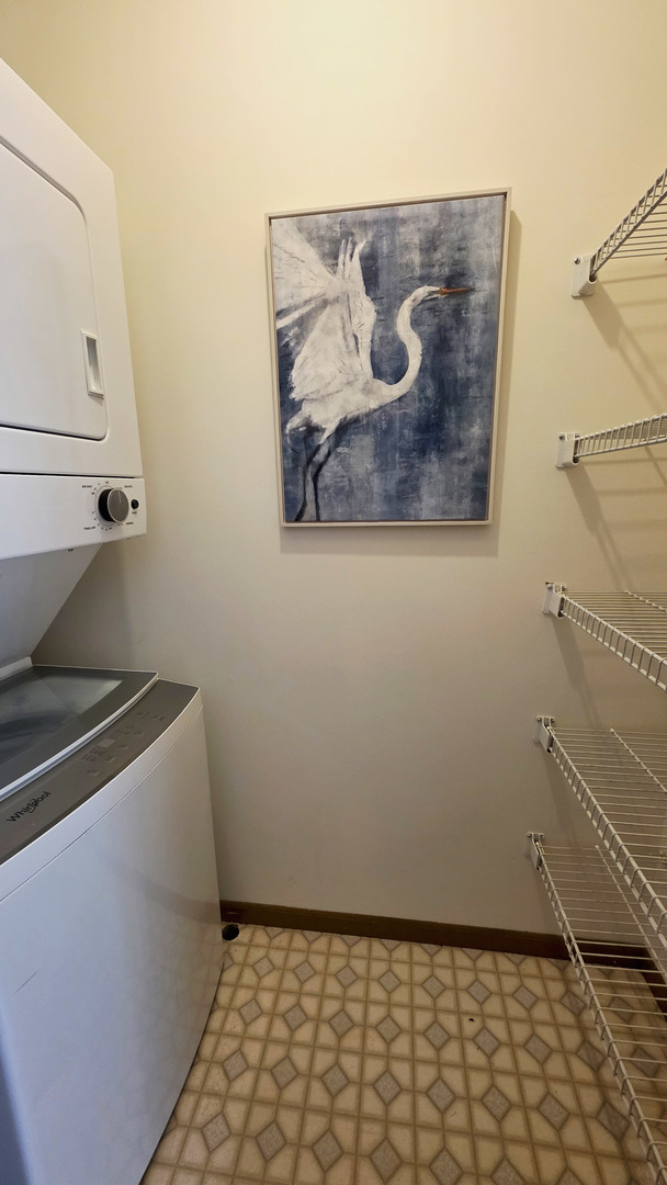 4302 West Shamrock Lane, Unit 3C McHenry, IL 60050 - Photo 7 of 20 a bathroom with a sink and a window