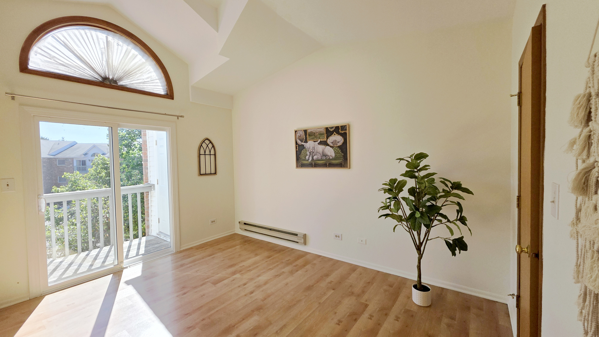 4302 West Shamrock Lane, Unit 3C McHenry, IL 60050 - Photo 8 of 20 a view of entryway with wooden floor