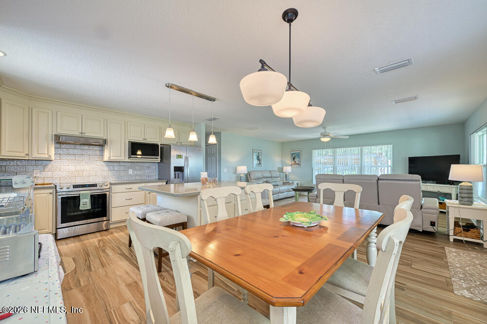 7837 Rusty Anchor Road St. Augustine, FL 32092 - Photo 9 of 41 Kitchen Dining and Living Rooms - View 1