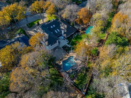 an aerial view of residential house with outdoor space