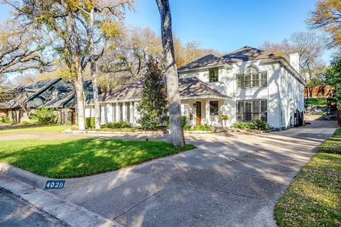 a view of a building with a garden